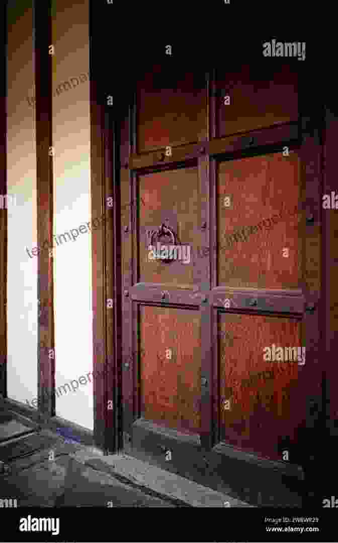 A Close Up Photograph Of A Wooden Door With Intricate Carvings And A Brass Knocker. Doors: An Artbook Richard Neer