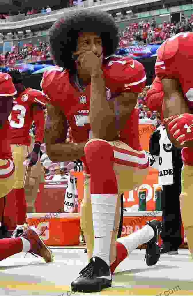 A Photo Of Colin Kaepernick Kneeling During The National Anthem Social Issues In Sport Ron Woods